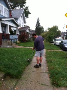 John using weed wacker during hale storm