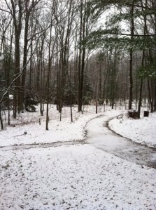 Lake house with snow